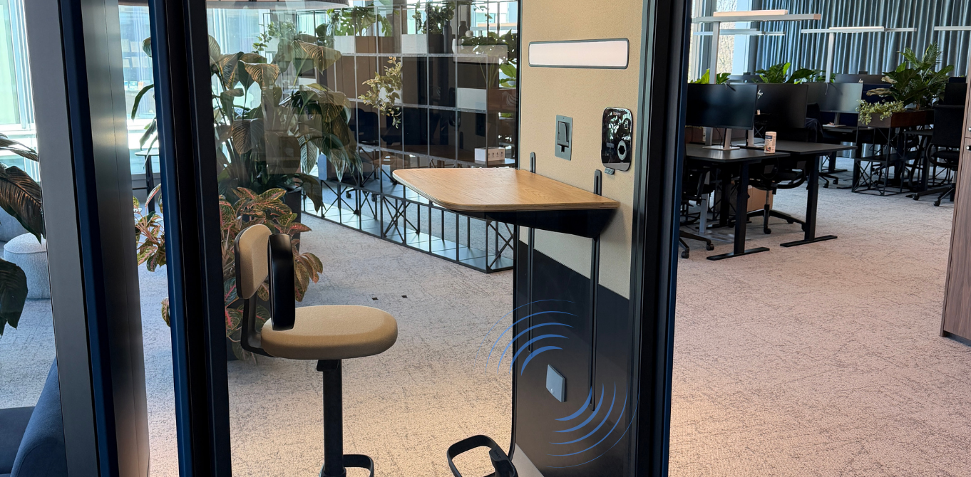 ROOMZ presence sensor installed in a shared workspace